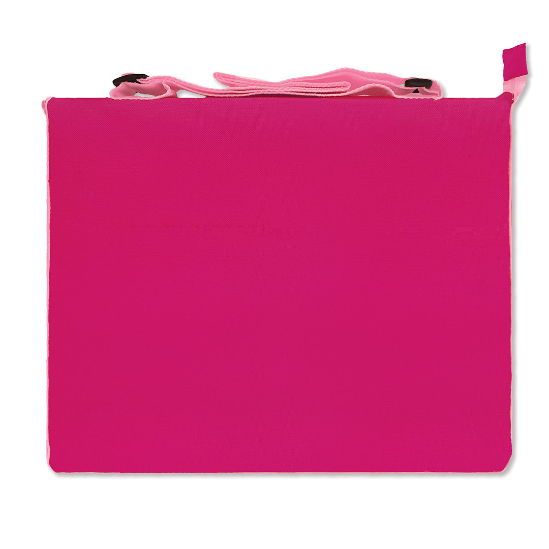 The back of a folded pink beach mat