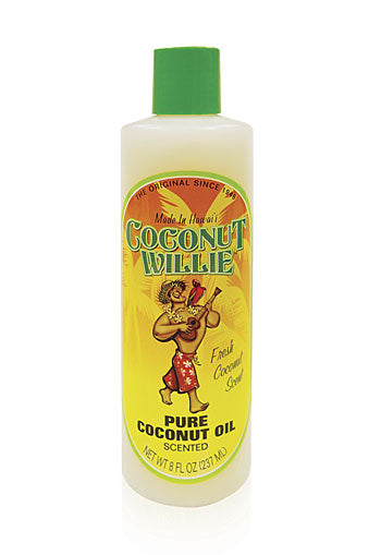 Bottle of Coconut Willie pure coconut oil with a green cap and a label featuring a cartoon of a coconut character