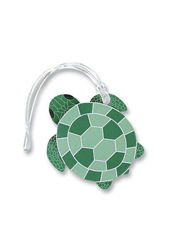 Die cut ID tag shaped like a honu (sea turtle), featuring detailed designs and vibrant colors, perfect for identifying bags or belongings.