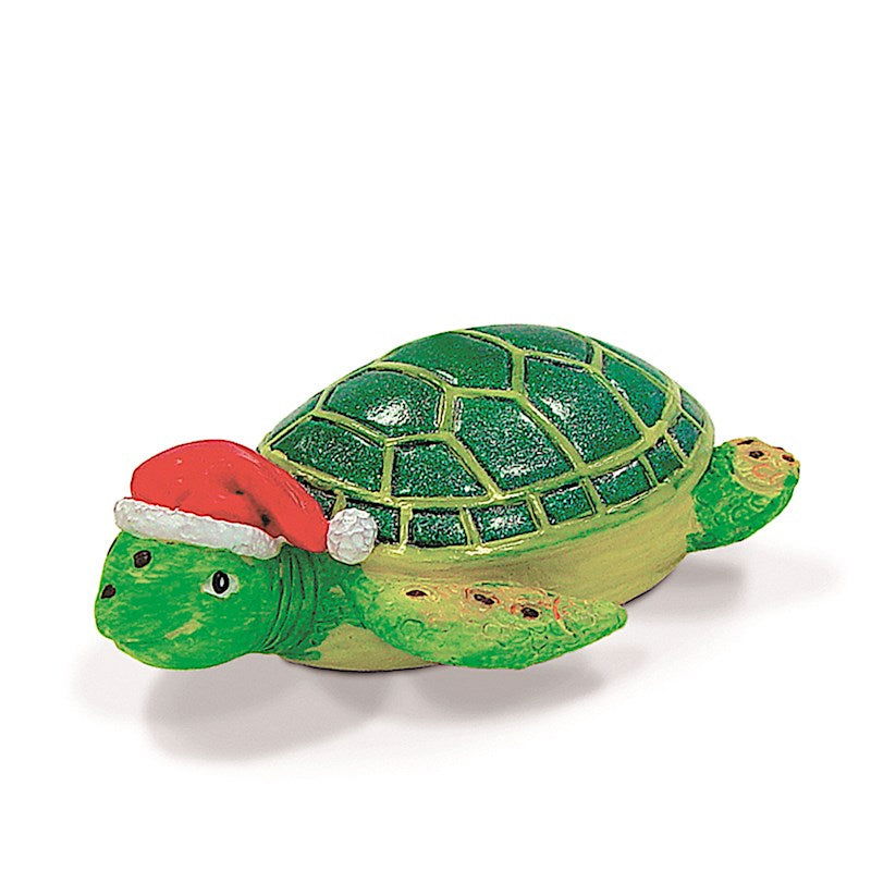Holiday ornament featuring a honu (sea turtle), adorned with festive decorations, symbolizing a tropical and cheerful holiday spirit.