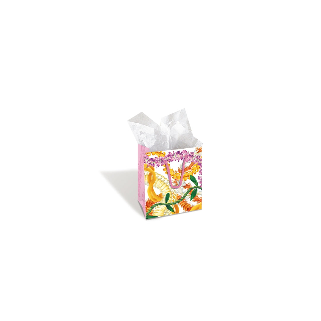 Hawaii gift bag floral lei themed with tissue paper.