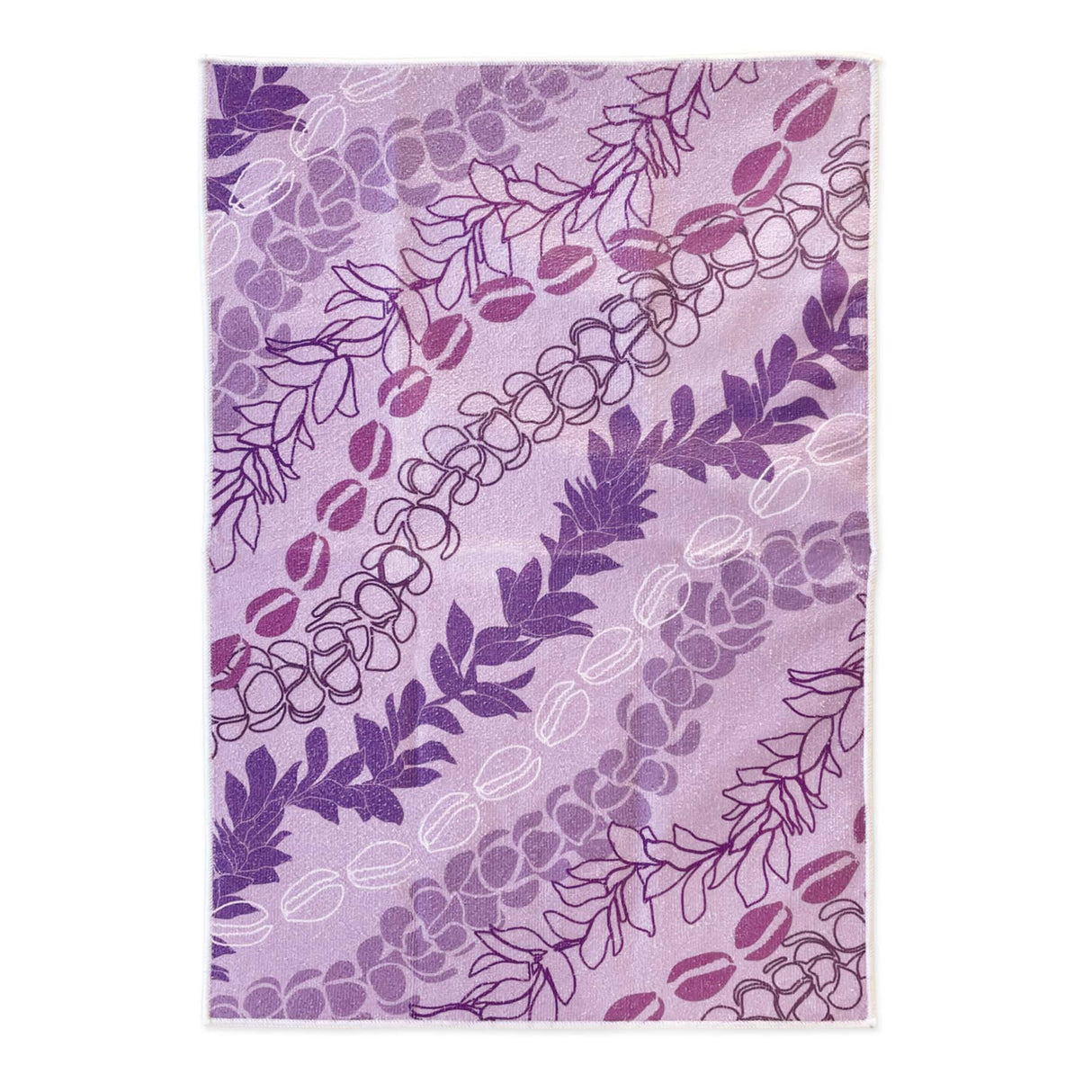 Purple lei floral patterned kitchen towel on a white background