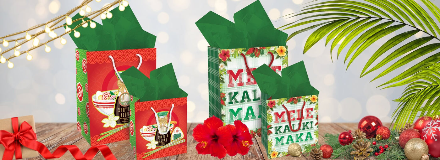 Island Heritage's Christmas Gift Bags collection banner, featuring Hawaiian-inspired gift bags that bring the spirit of aloha to your holiday gifting