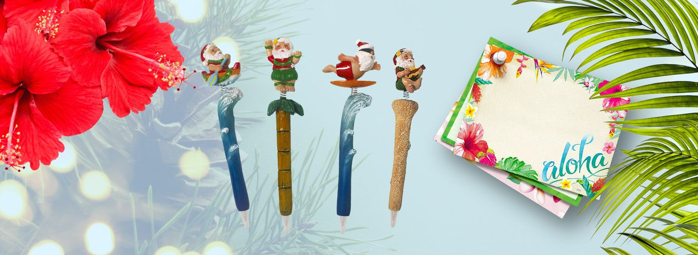 Island Heritage's Christmas pens collection banner, featuring festive Hawaiian-themed pens perfect for holiday gifts and celebrations