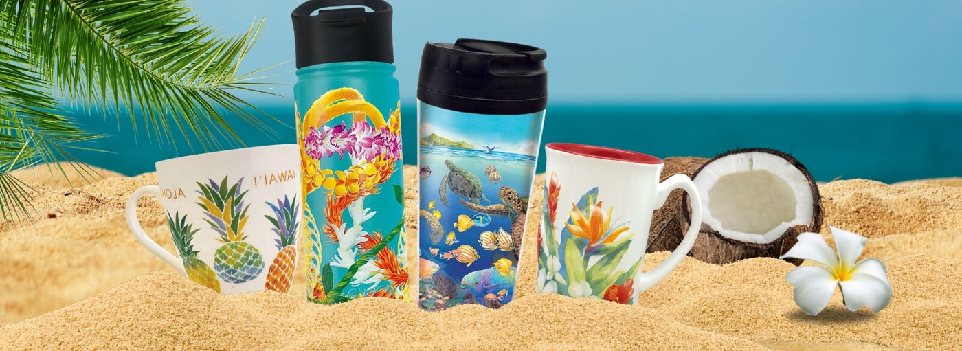 Hawaii mug, water bottle, coffee cup and coconut in the sand
