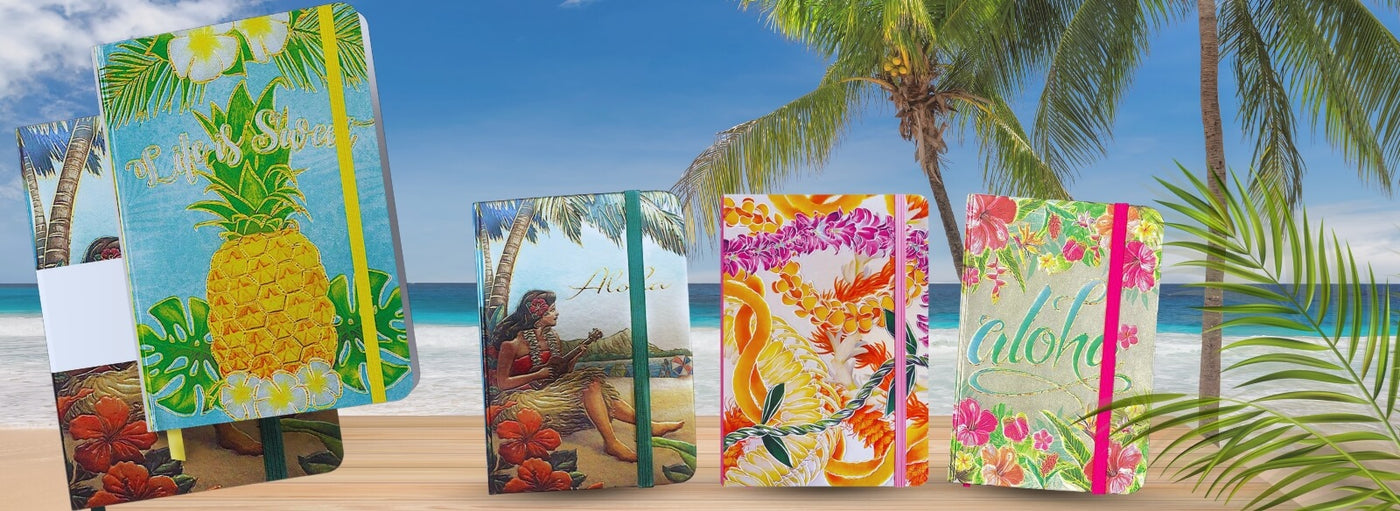 Hawaii beach with aloha, pineapple, hula ukulele leis bound notebooks.