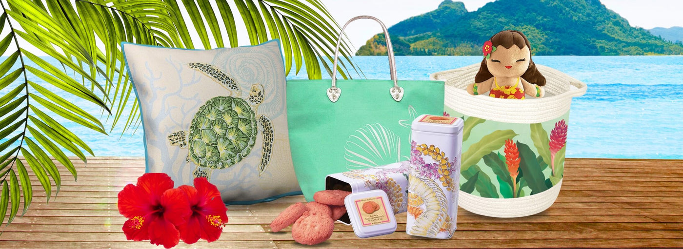 Banner with tropical plants and flowers, island, ocean, Hawaii turtle pillow, teal tote bag, floral woven bucket, hula girl plush, cookie tins, and cookies.