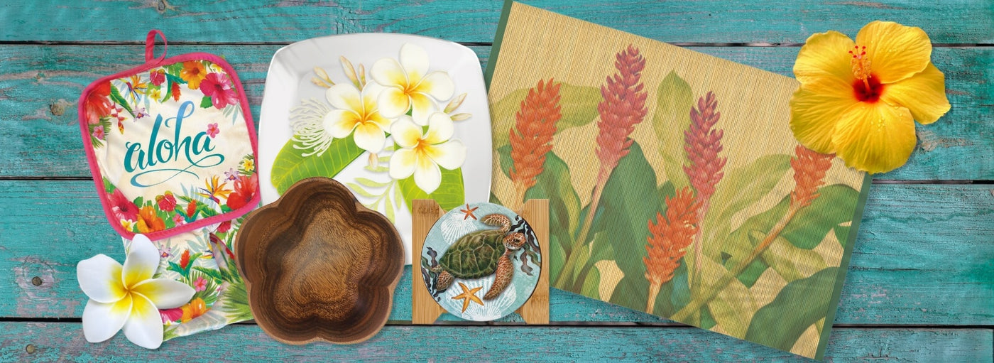 Banner with blue wood background, tropical flowers, and Hawaii aloha oven mitt, plate, bowel, coaster, and mat.
