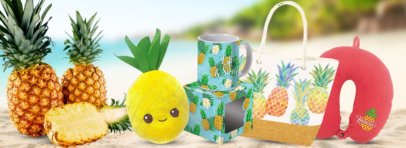 Beach with pineapples, plush, mug, tote bag, and neck pillow.