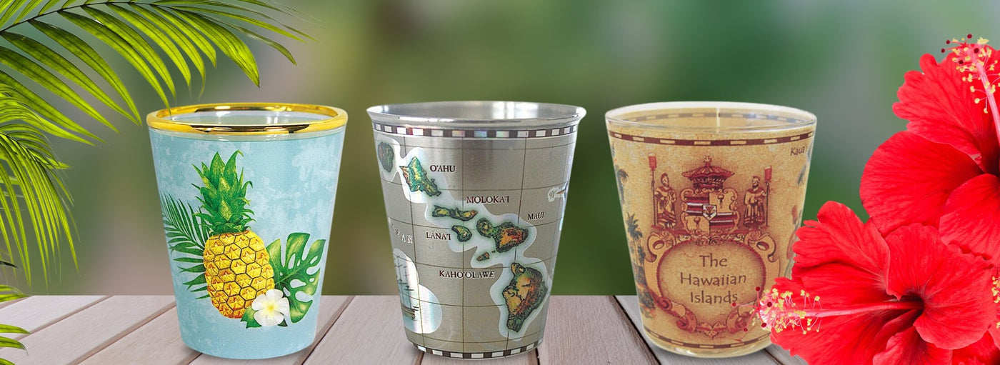 banner with three Hawaiian themed cups with flowers and palm leaves.
