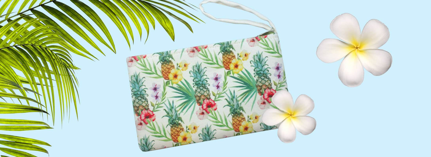 Discover vibrant tropical clutches from Island Heritage, perfect for adding a pop of Hawaiian style to any outfit.