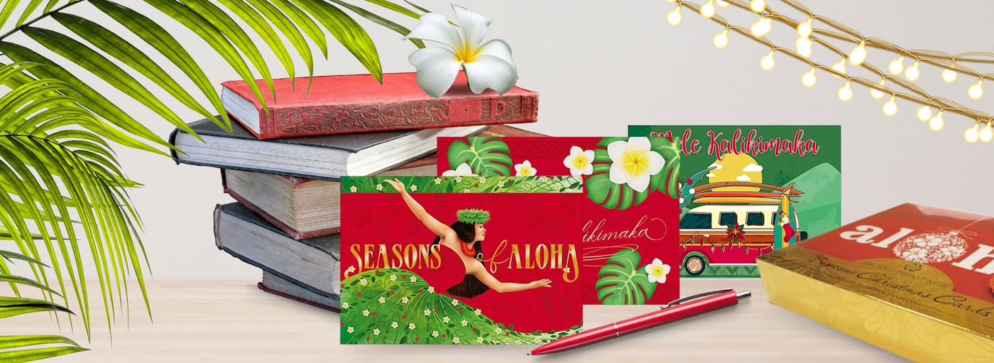 Island Heritage's value pack of assorted Christmas cards, featuring tropical-themed holiday greetings in a festive collection