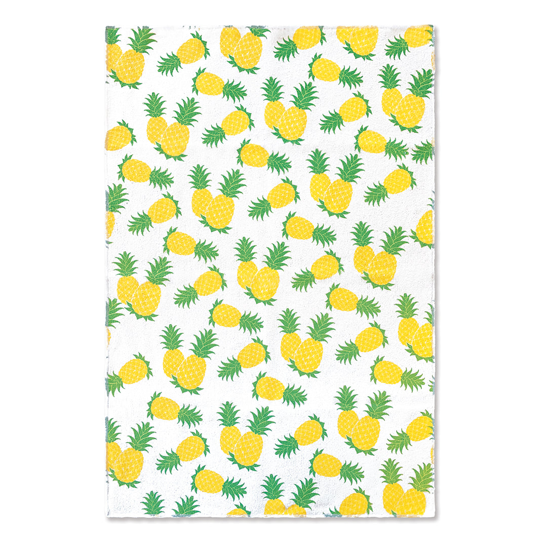 A white microfiber kitchen towel with pineapples.