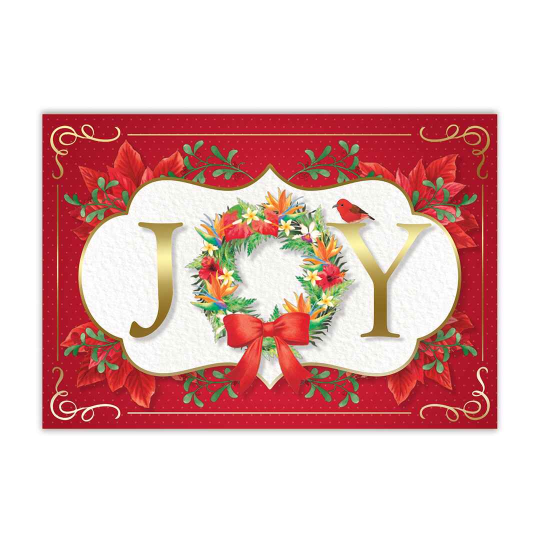 A Christmas card with a floral wreath and the word 'JOY' in the center.