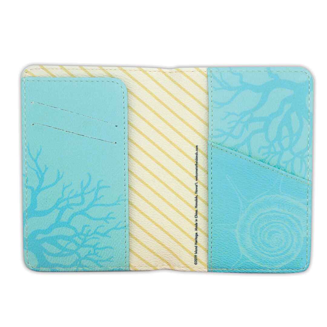 The inside of a blue Hawaii passport holder.