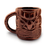 14 oz. tiki mug in dark brown, featuring intricate tiki carvings and a traditional design, perfect for tropical beverages.