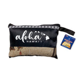 A black mesh zipped package of an island travel blanket with words aloha Hawaii and a map of the islands