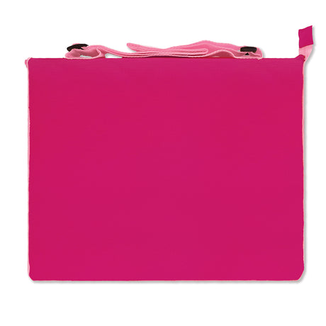 The back of a folded pink beach mat 