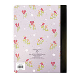 Back of a composition book lavender color with Hawaiian flowers