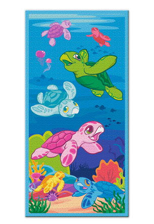 Beach towel featuring a cute Honu Ohana design, showcasing playful sea turtles in a colorful tropical setting, perfect for beach outings."