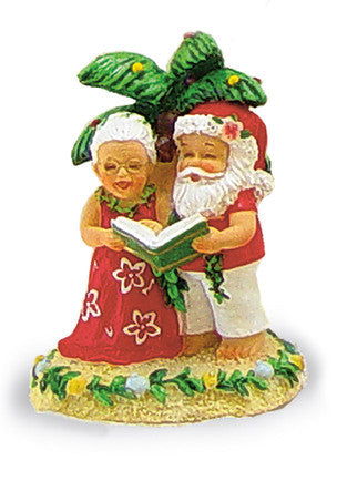 Holiday ornament featuring the Caroling Clauses, depicting Santa and Mrs. Claus joyfully singing Christmas carols together in a festive scene.