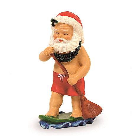 Holiday ornament showcasing Paddleboarding Santa, featuring Santa Claus paddling on a board in a cheerful, tropical water setting.