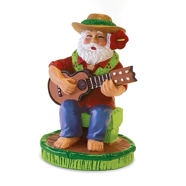 Figurine of Santa playing a guitar on a white background