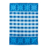 Blue and white checkered towel with decorative patterns on a white background