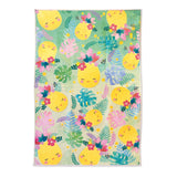 kitchen towel with smiley face pineapple design and floral elements on a green background
