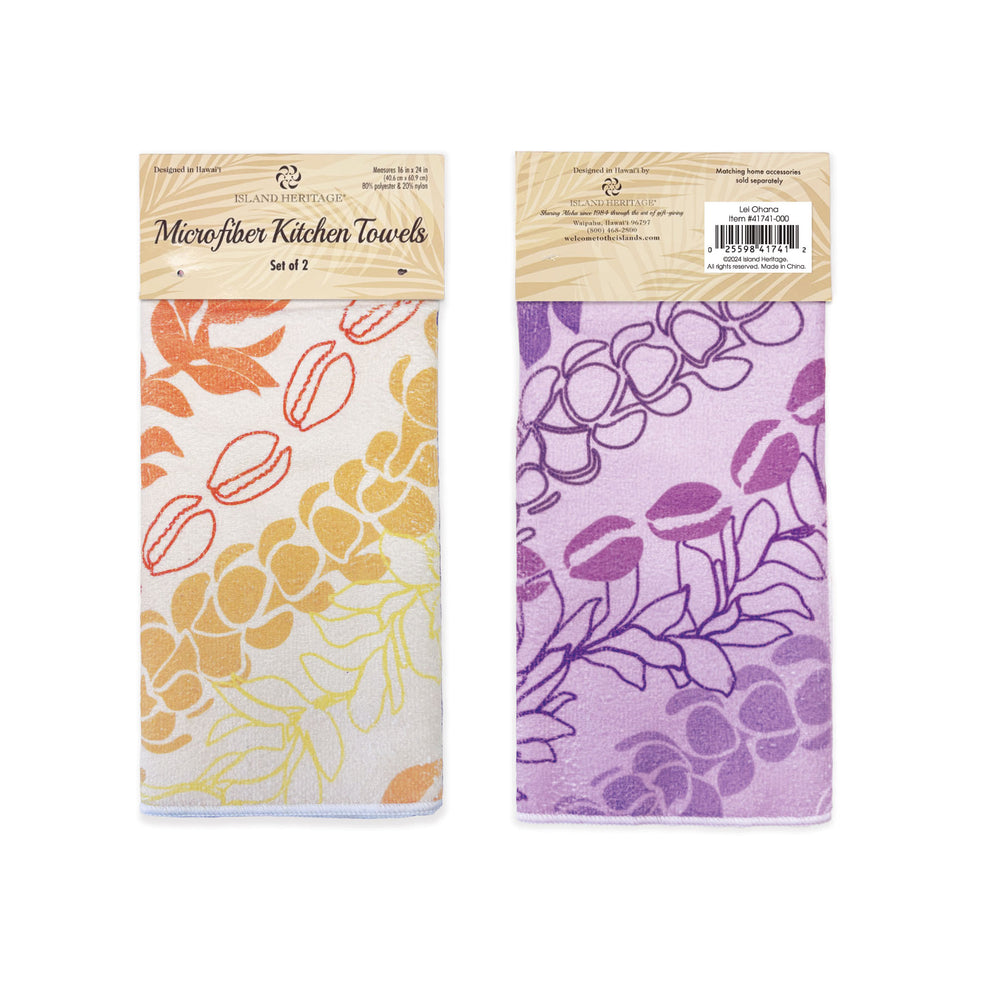 Two microfiber kitchen towels with floral patterns in packaging on a white background