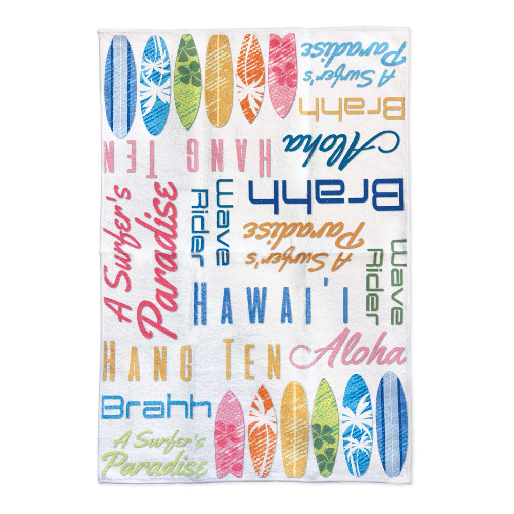 Kitchen towel with colorful surfboard designs and text on a white background
