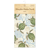 Package of white microfiber kitchen towels with Hawaiian sea turtles.
