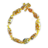 Candy Lei Kit, Hibiscus Lei in gold, shown in a mockup with the kit's contents and elegant hibiscus floral design for crafting colorful leis.