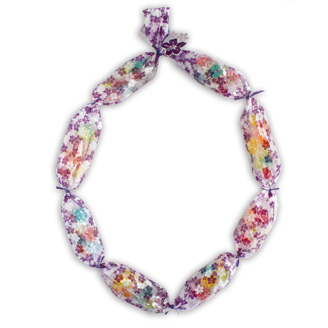 Candy Lei Kit, Hibiscus Lei in purple, displayed in a mockup showing the kit's contents and a bright tropical hibiscus flower theme.