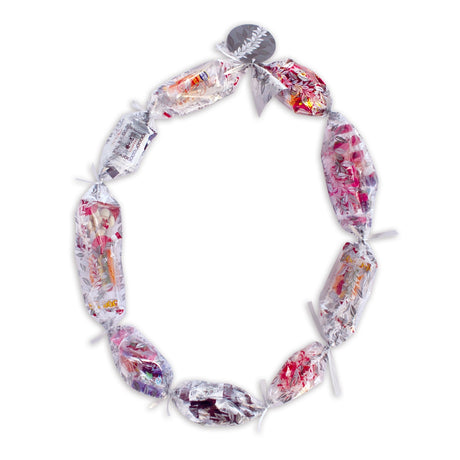 Candy Lei Kit, Maile in silver, shown in a mockup with contents and Maile leaf accents for a stylish, fun lei-making experience.