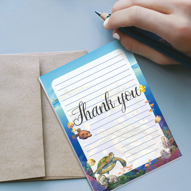 Ocean Friends notepad featuring playful sea life illustrations, ideal for jotting down notes with a tropical, island-inspired design.
