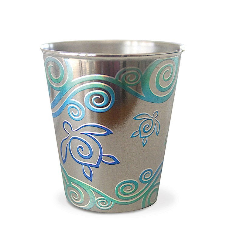 Stainless steel foil shot glass featuring a Honu Swirl design, showcasing colorful sea turtle patterns, ideal for enjoying your favorite drinks in style.