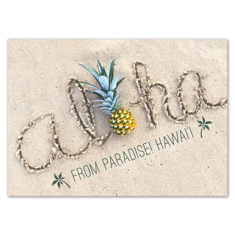 Postcard with a pineapple and 'aloha' text on sand, featuring 'From Paradise! Hawaii!' text.