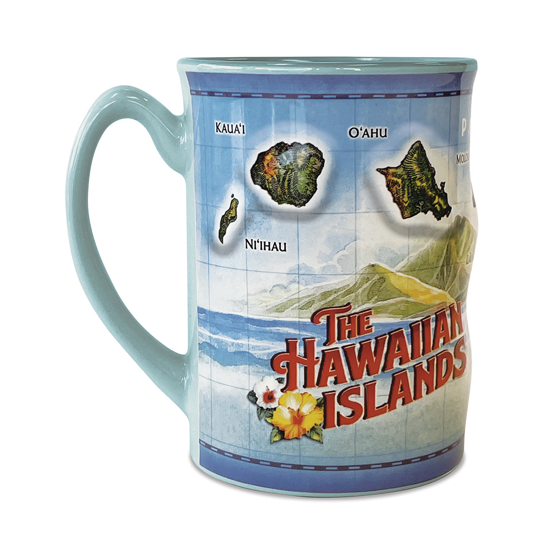 A blue ceramic mug with an embossed design featuring a map of Hawaii and the text 'The Hawaiian Islands'.