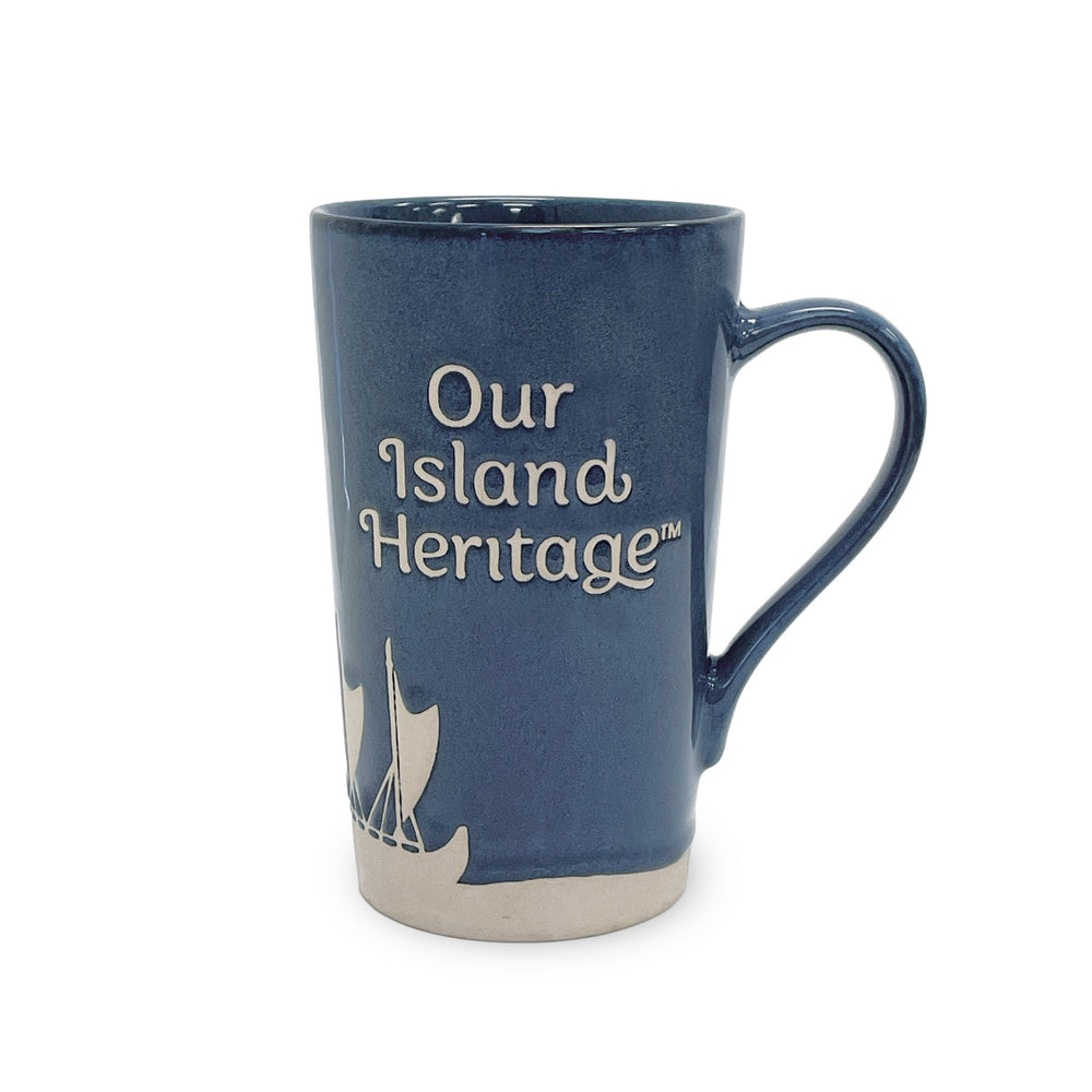 dark blue mug with 'Our Island Heritage' text on a white background