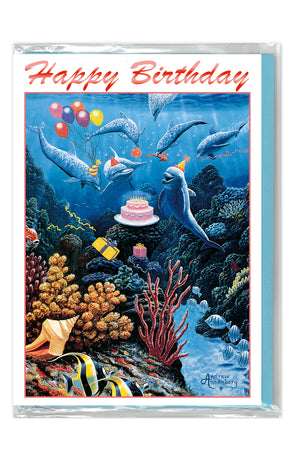 Birthday card with an underwater scene featuring dolphins and a cake, with 'Happy Birthday' text at the top.