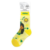 Yellow sock with a design of a woman, sun, and flowers, labeled 'Aloha', on a white background.