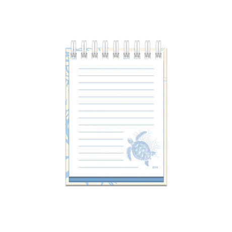the interior of a spiral note book that is Hawaii turtle themed.