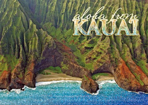 Scenic view of Kauai with text 'aloha from KAUAI' over a mountainous landscape.