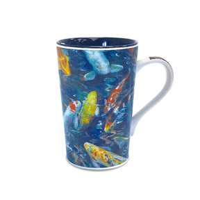 Mug with colorful fish design on a blue background