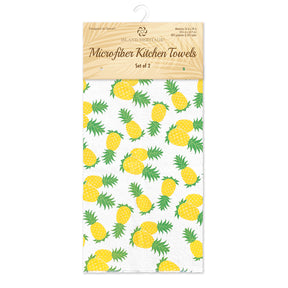 Package of white microfiber kitchen towels with pineapples.