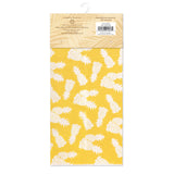 A packaged yellow with white pineapples kitchen mat,